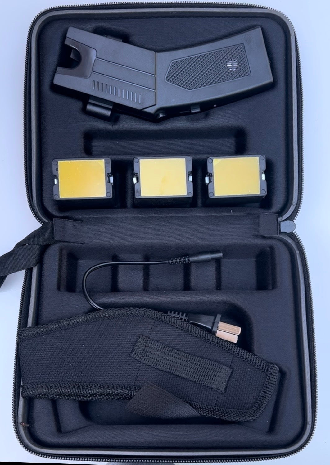 4-in-1 Stun Gun + Taser + Flashlight + Laser